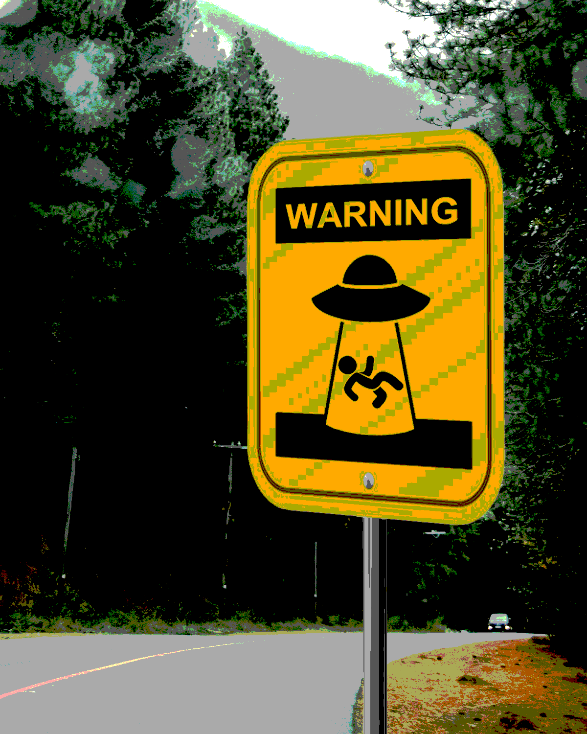 A roadside sign that warns passersby of UFO activity.